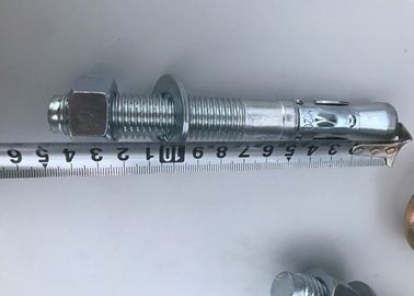 Passe os parafusos de âncora concretos da cunha do material M10*100 com zinco azul/branco chapeado